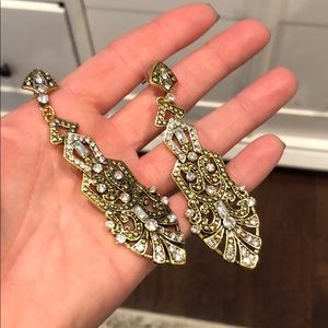 Gold toned flapper earrings